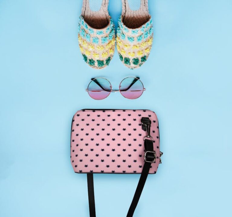 Luxury bag and accessories flat lay — capsule wardrobe